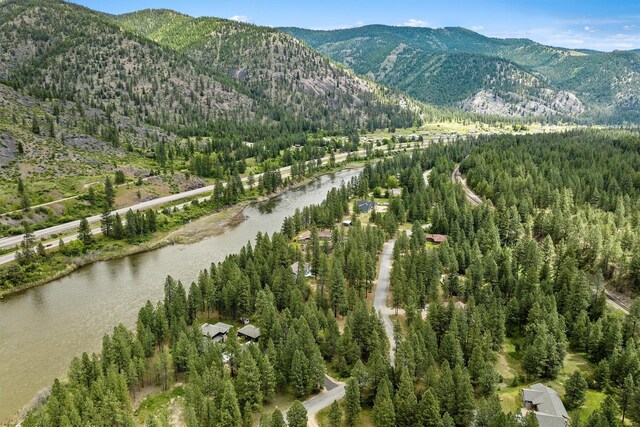 bird's eye view featuring a water and mountain view