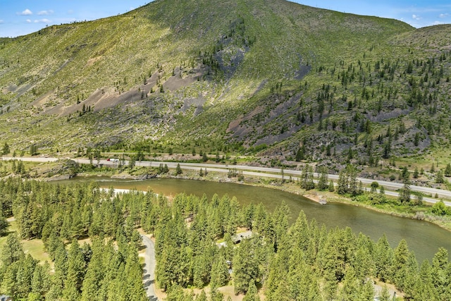 view of mountain feature featuring a water view