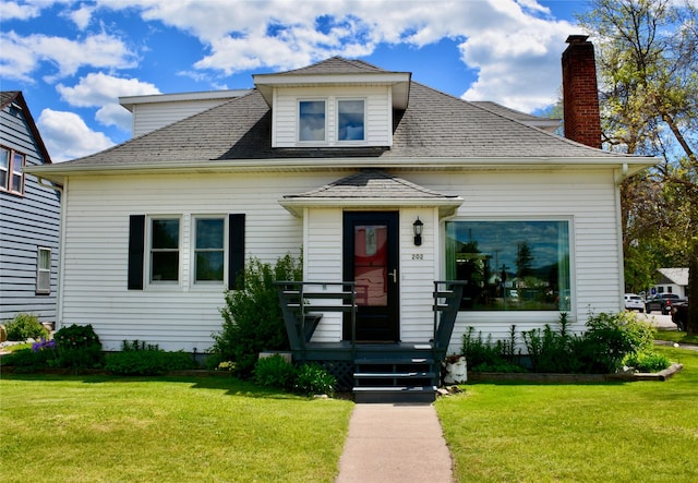 bungalow with a front yard