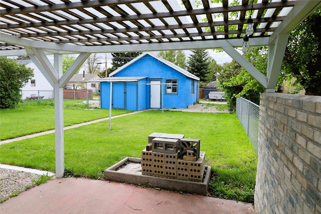 view of yard featuring a storage unit and a pergola