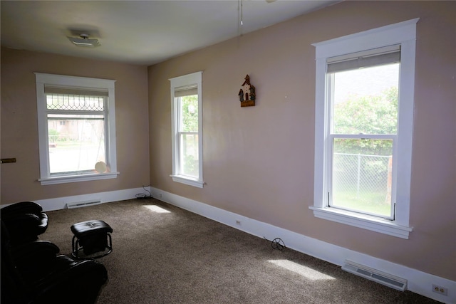 unfurnished room with carpet floors