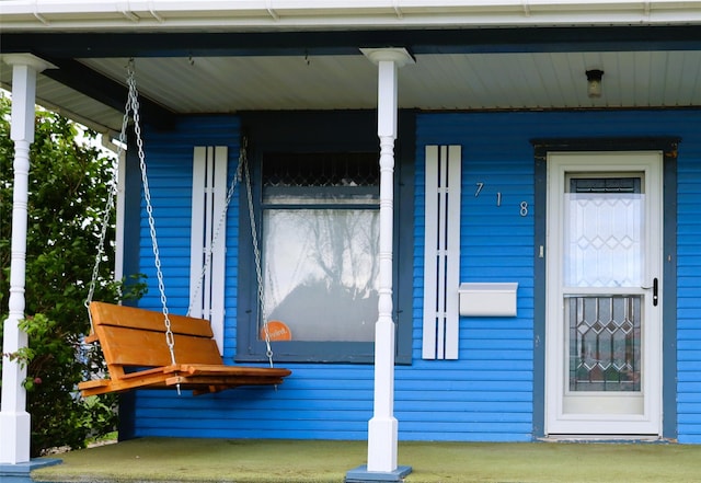 exterior space featuring covered porch