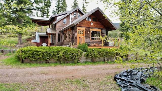 view of log-style house