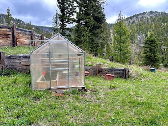 view of outdoor structure featuring a mountain view