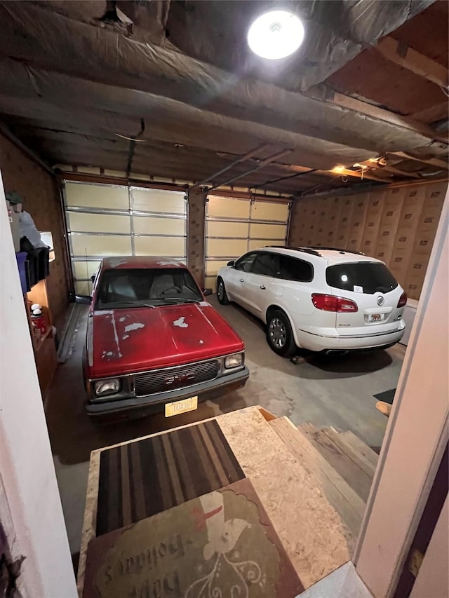 garage featuring a carport