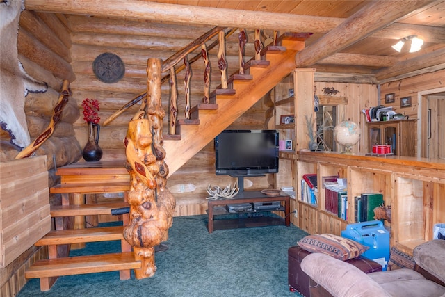 living room featuring carpet, beam ceiling, rustic walls, and wooden ceiling