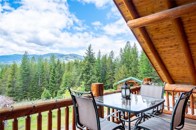 wooden terrace featuring a mountain view