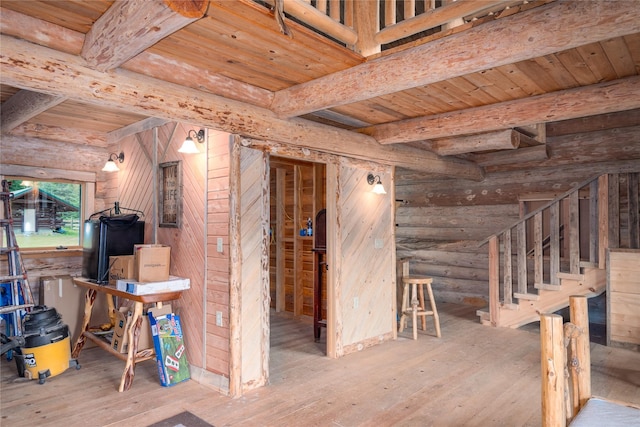 basement with light hardwood / wood-style floors