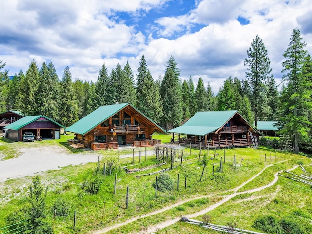 view of property's community with a rural view and an outdoor structure