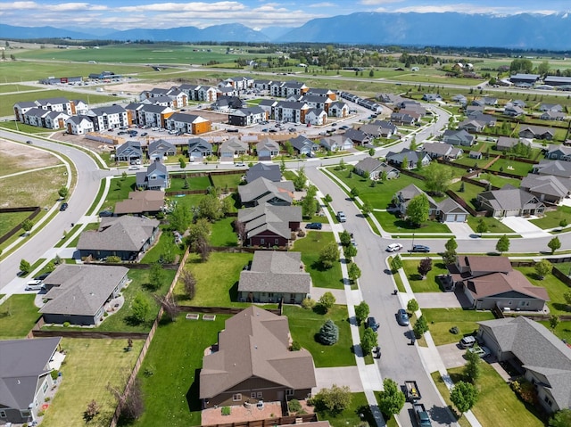 bird's eye view featuring a residential view and a mountain view