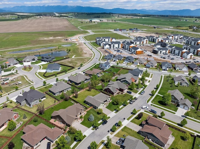 bird's eye view with a residential view and a mountain view