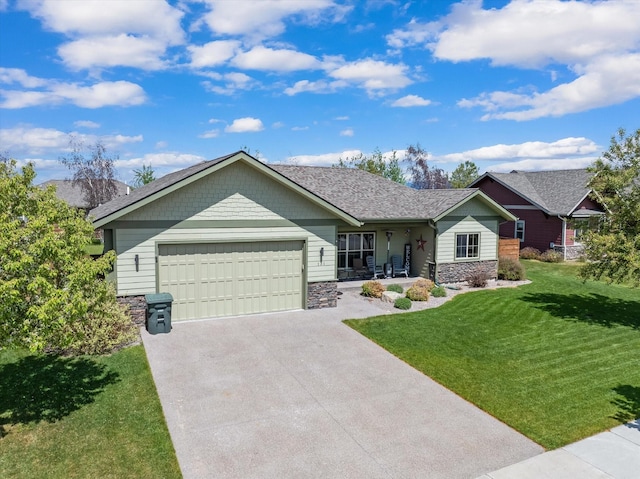 ranch-style house with a garage, a front yard, stone siding, and concrete driveway