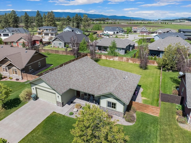 aerial view with a residential view and a mountain view