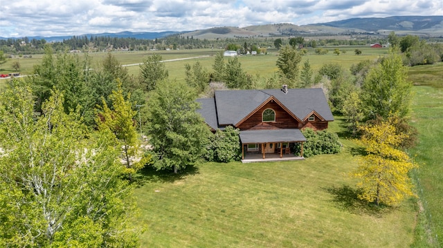 bird's eye view with a mountain view and a rural view