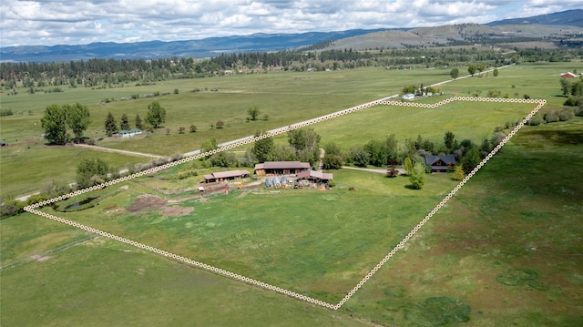 bird's eye view with a mountain view and a rural view