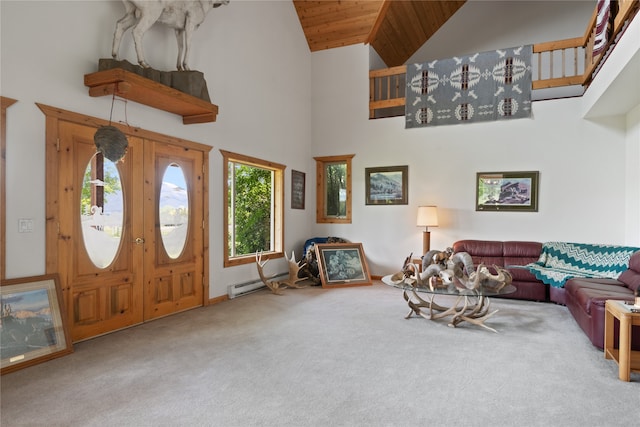 entryway featuring a baseboard heating unit, high vaulted ceiling, carpet floors, and wooden ceiling