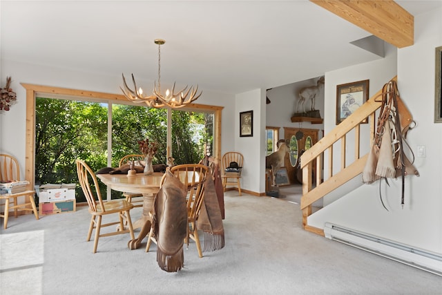 625 Middle Burnt Fork Rd, Stevensville, MT 59870 - dining area featuring baseboard heating, stairs, a chandelier, and carpet floors