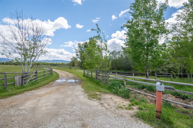 view of road featuring a rural view