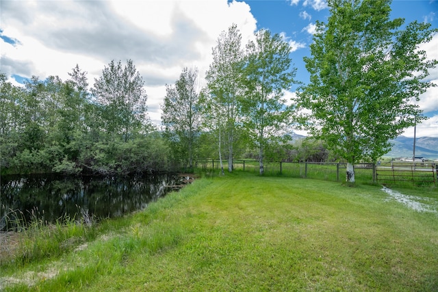 625 Middle Burnt Fork Rd, Stevensville, MT 59870 - view of yard featuring a water view and a rural view