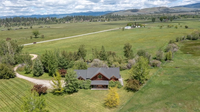 bird's eye view featuring a rural view and a mountain view