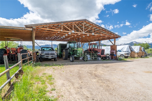 625 Middle Burnt Fork Rd, Stevensville, MT 59870 - view of car parking featuring a detached carport and dirt driveway