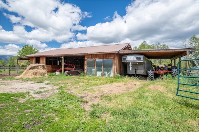 625 Middle Burnt Fork Rd, Stevensville, MT 59870 - view of outbuilding with an attached carport