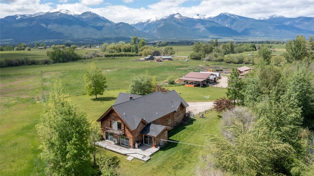 bird's eye view featuring a rural view and a mountain view