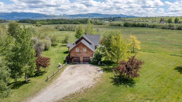 aerial view with a mountain view and a rural view