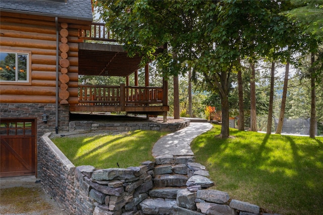 view of yard featuring a deck