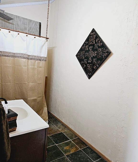 bathroom with vanity and tile patterned floors