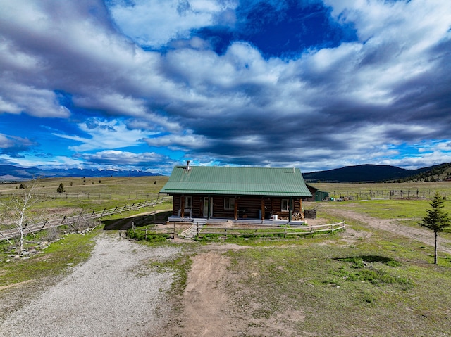 view of outbuilding with a rural view