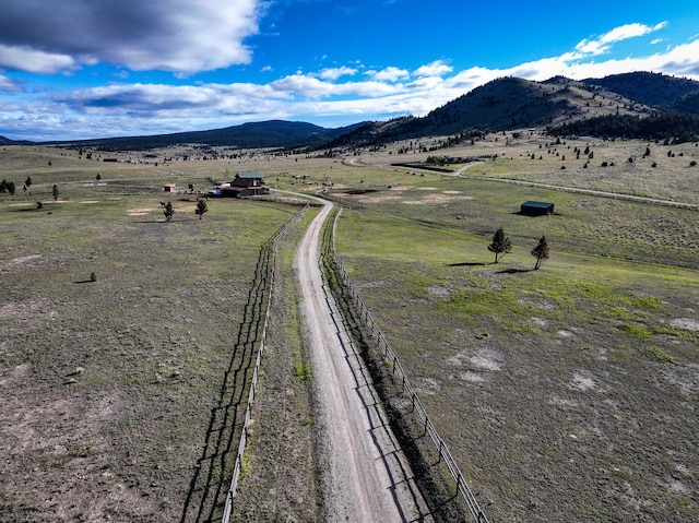 view of mountain feature with a rural view