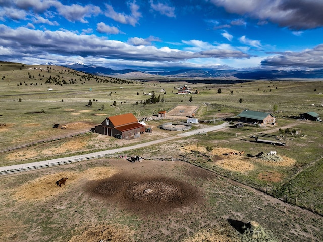 aerial view with a mountain view and a rural view