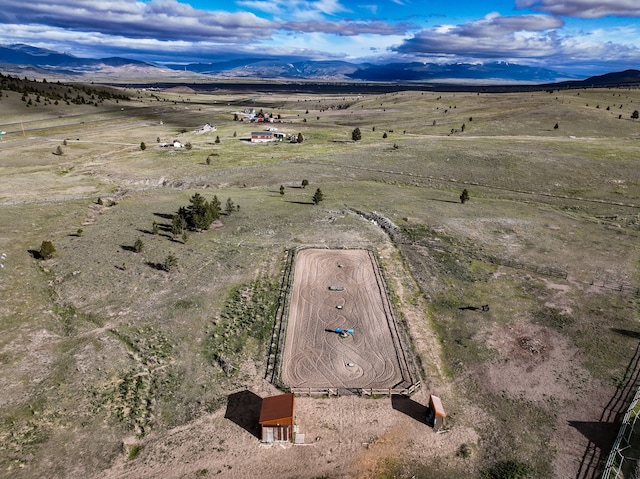 aerial view with a mountain view and a rural view