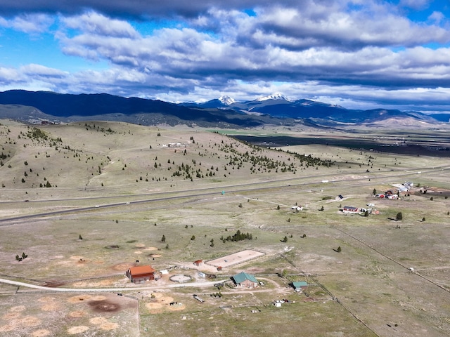 aerial view featuring a mountain view and a rural view