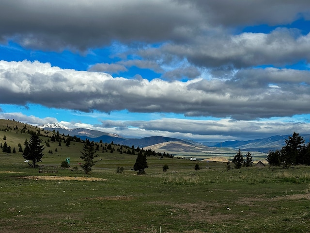 property view of mountains with a rural view