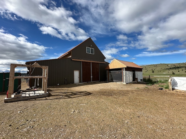 exterior space with an outbuilding