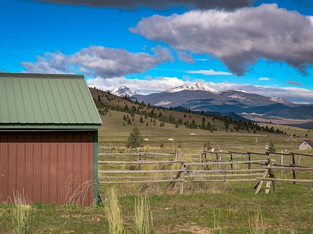 view of mountain feature with a rural view