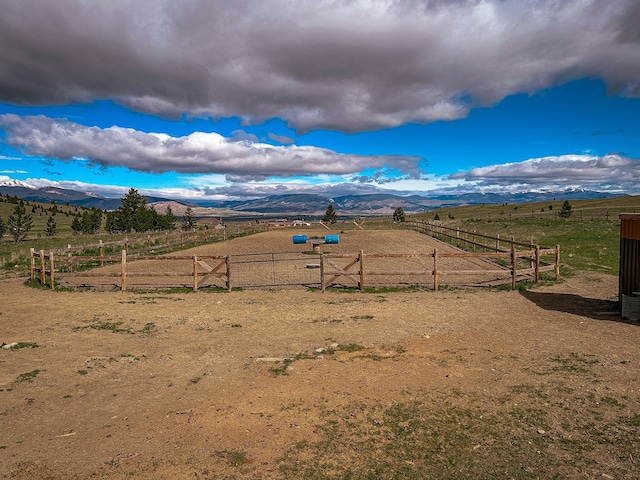 property view of mountains featuring a rural view