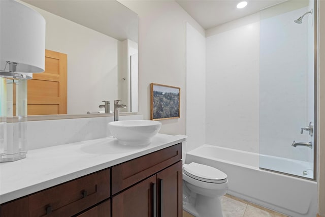 full bathroom with vanity, tile patterned flooring, toilet, and washtub / shower combination