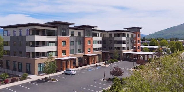 view of building exterior featuring a mountain view