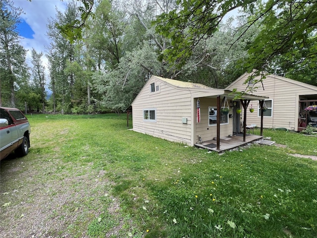 view of home's exterior featuring a yard