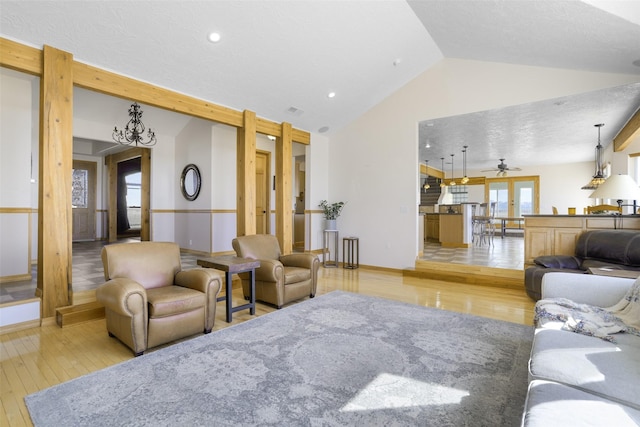 1030 Sun River Cascade Rd, Sun River, MT 59483 - living area with a ceiling fan, recessed lighting, wood-type flooring, baseboards, and vaulted ceiling