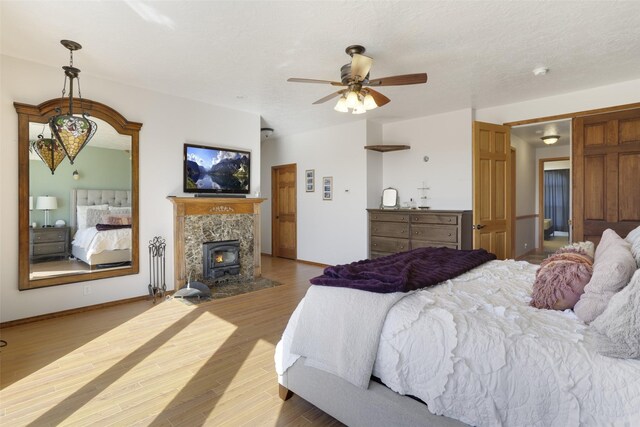 bedroom featuring ceiling fan and light hardwood / wood-style floors