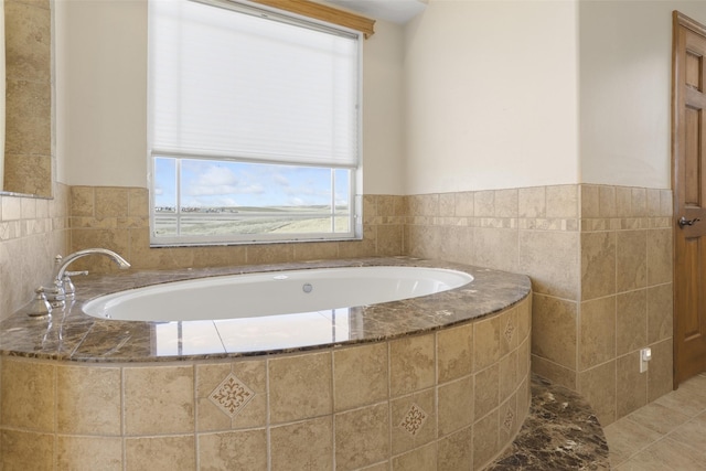 1030 Sun River Cascade Rd, Sun River, MT 59483 - full bath featuring tile patterned floors, tile walls, and a bath