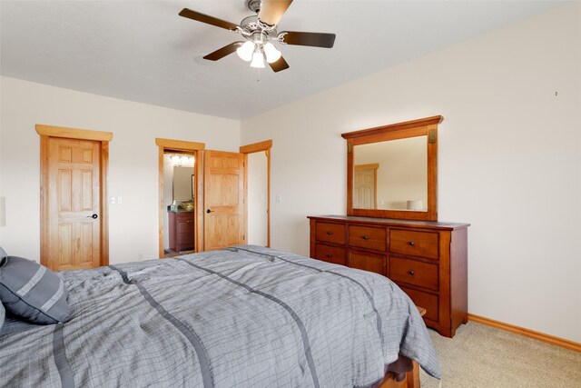 bedroom featuring ceiling fan and light colored carpet