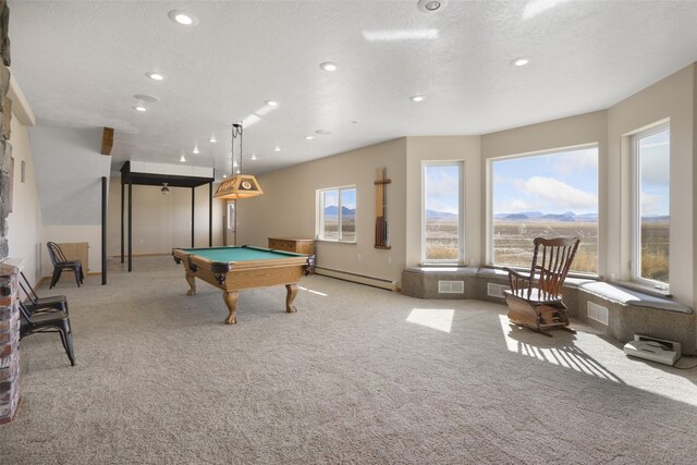 playroom with baseboard heating, light carpet, billiards, and a textured ceiling