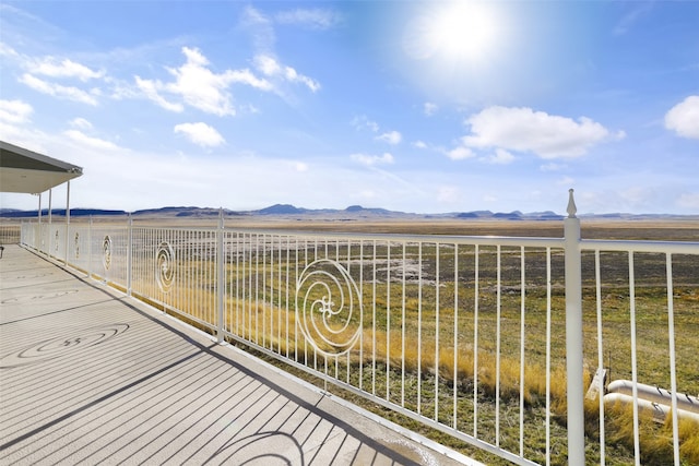 balcony featuring a mountain view