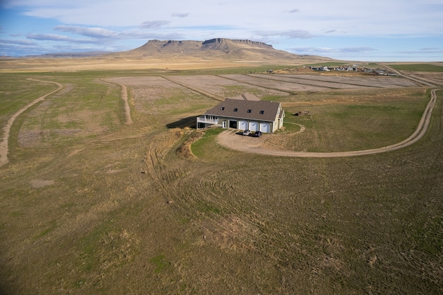 aerial view featuring a rural view and a mountain view