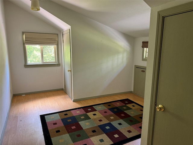 interior space with light wood-type flooring and baseboards